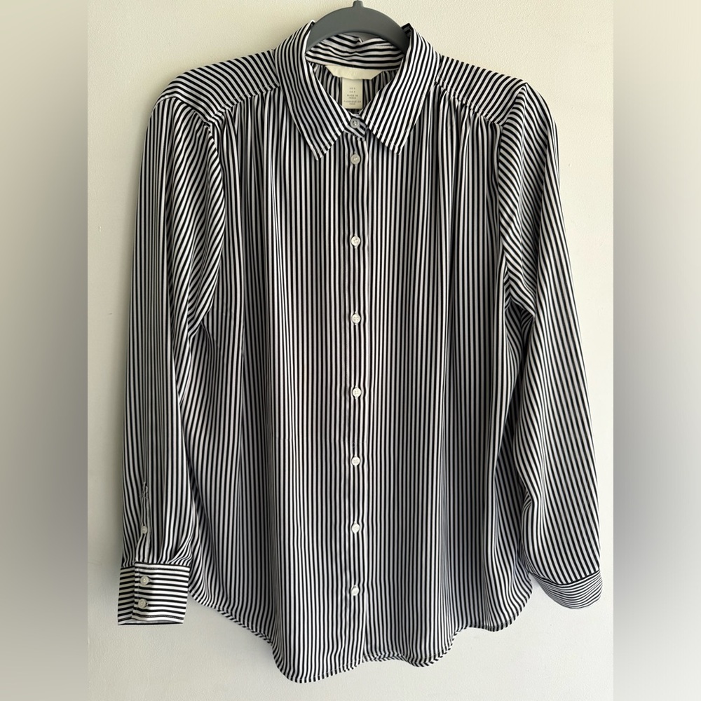 Collar buttons at front. Long sleeves. White/black striped. Small.